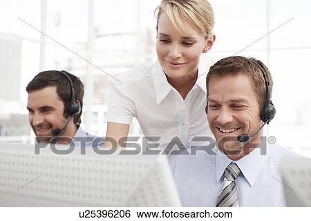 Young people at work View Large Photo Image Stock Photograph - Young people at work. Fotosearch