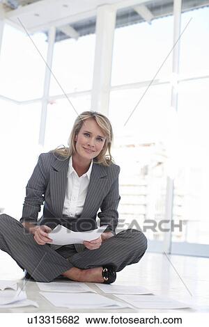 Young woman at work View Large Photo Image Stock Image - Young woman at work. Fotosearch