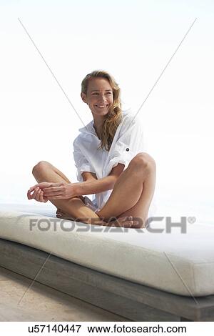Young woman in a design house View Large Photo Image Stock Photo - Young woman in a design house. Fotosearch