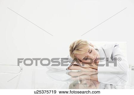 Young woman relaxing View Large Photo Image Stock Photo - Young woman relaxing. Fotosearch