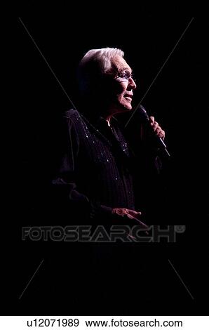 Stock Photo - Andy Williams performs at the Moon River Theatre in Branson, Missouri. Fotosearch