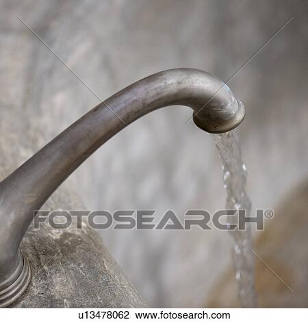 Stock Image - Bath tap in Costa Rica. Fotosearch