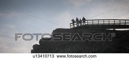 Stock Image - Boardwalk lookout point at rugged mountaintop. Fotosearch