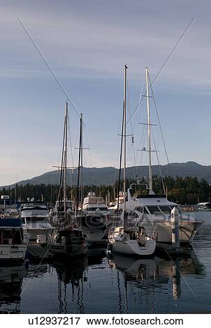 Boats docked in Vancouver, British Columbia, Canada View Large Photo Image Stock Photo - Boats docked in Vancouver, British Columbia, Canada. Fotosearch