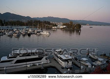 Boats docked in Vancouver, British Columbia, Canada View Large Photo Image Stock Photo - Boats docked in Vancouver, British Columbia, Canada. Fotosearch