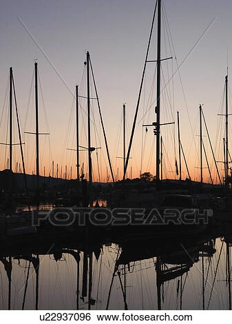 Stock Photograph - Boats with reflections at the marina in Vancouver, British Columbia, Canada. Fotosearch