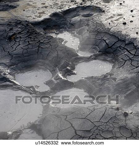 Boiling geothermal cracked mud puddles View Large Photo Image Stock Image - Boiling geothermal cracked mud puddles. Fotosearch
