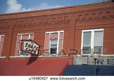 Stock Photo - Cafe sign in downtown historic district in Branson, Missouri. Fotosearch