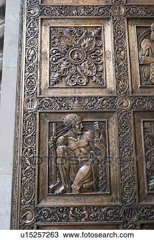 Stock Image - Carved door on the Plummer Building at the Mayo Clinic in Rochester Minnesota. Fotosearch