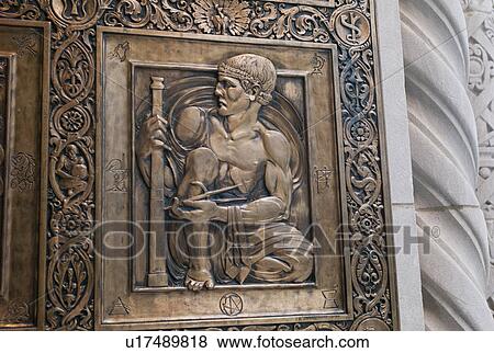 Stock Photo - Carved door on the Plummer Building at the Mayo Clinic in Rochester Minnesota. Fotosearch