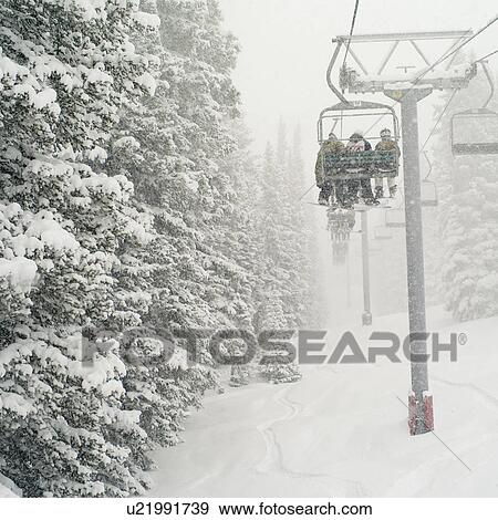 Chairlift on a ski slope in Vail, Colorado View Large Photo Image Stock Photo - Chairlift on a ski slope in Vail, Colorado. Fotosearch