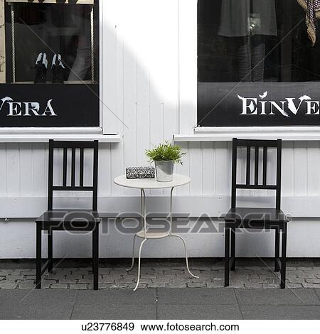 Stock Photo - Chairs and table outdoor cafe. Fotosearch