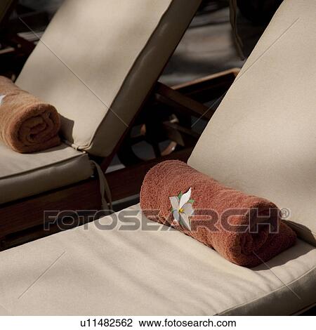 Stock Image - Chaise lounge at Florblanca Resort in Costa Rica. Fotosearch