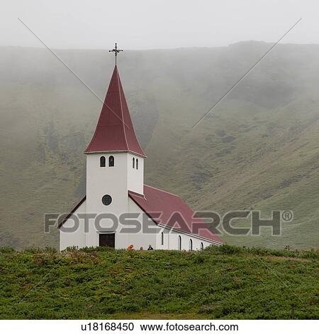 Stock Image - Christian church in misty valley. Fotosearch