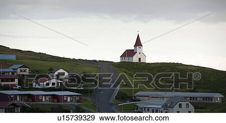 Christian church on hilltop, above dwellings, with a dirt road View Large Photo Image Stock Photo - Christian church on hilltop, above dwellings, with a dirt road. Fotosearch