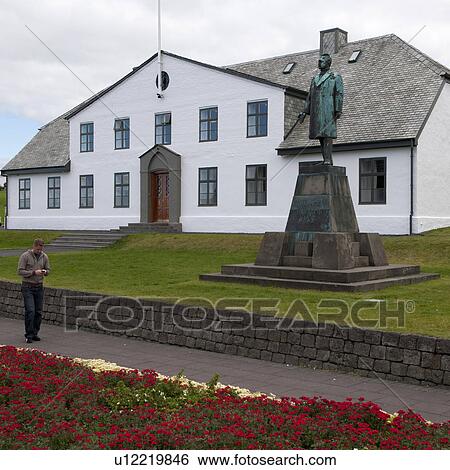 Civic building with statue and flower garden View Large Photo Image Stock Photograph - Civic building with statue and flower garden. Fotosearch