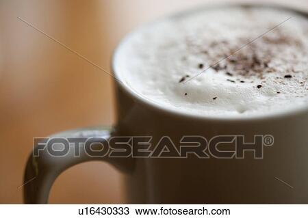 Coffee in a mug with milk foam and spices View Large Photo Image Stock Image - Coffee in a mug with milk foam and spices. Fotosearch