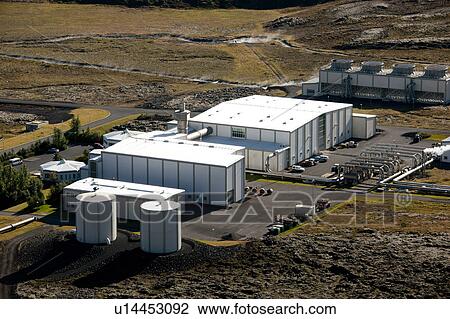Stock Image - Commercial warehouses in a field. Fotosearch