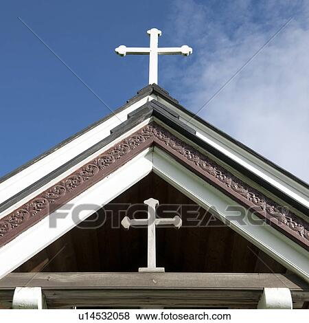 Stock Photo - Crosses on Christian church roof. Fotosearch