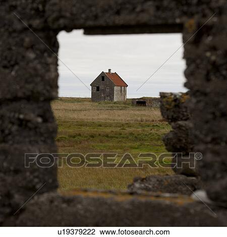 Derelict building through rock wall window frame View Large Photo Image Stock Image - Derelict building through rock wall window frame. Fotosearch