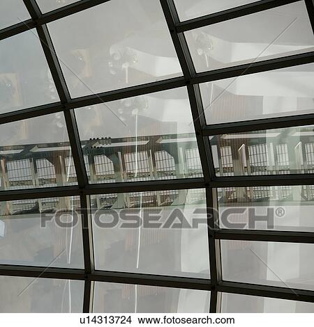 Picture - Distorted reflection in window panes. Fotosearch