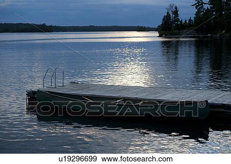 Dock and twilight sky at Lake of the Woods, Ontario View Large Photo Image Stock Photo - Dock and twilight sky at Lake of the Woods, Ontario. Fotosearch