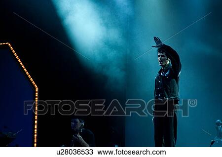 Stock Image - Elvis Presley impersonator performing in Branson, Missouri, U. S. A.. Fotosearch