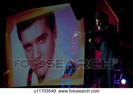 Stock Photo - Elvis Presley impersonator performing in Branson, Missouri, U. S. Ao. Fotosearch