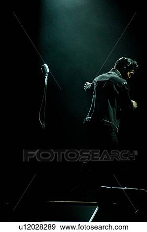 Stock Photo - Elvis Presley impersonator performing in Branson, Missouri, U. S. A.. Fotosearch