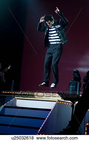 Stock Photo - Elvis Presley impersonator performing in Branson, Missouri, U. S. A.. Fotosearch