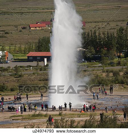 Erupting geyser and sightseers View Large Photo Image Stock Image - Erupting geyser and sightseers. Fotosearch