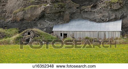 Stock Photo - Farm buildings buried under volcanic rock. Fotosearch