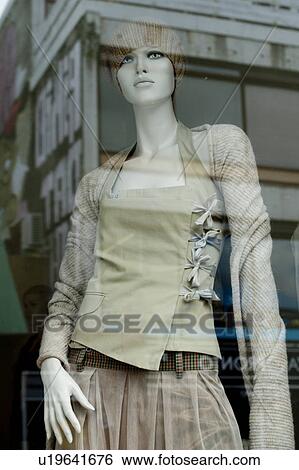 Stock Photograph - Female mannequin in a store window in Reykjavik Iceland. Fotosearch
