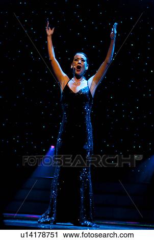 Stock Image - Female singer performing in Branson, Missouri. Fotosearch