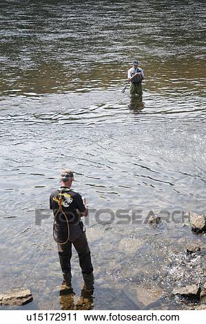 Fly fishing in lake Taneycomo in Branson, Missouri View Large Photo Image Stock Image - Fly fishing in lake Taneycomo in Branson, Missouri. Fotosearch
