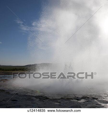 Geyser erupting into steam and droplets View Large Photo Image Stock Photography - Geyser erupting into steam and droplets. Fotosearch