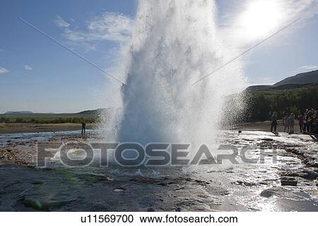 Geyser erupting with observers View Large Photo Image Stock Image - Geyser erupting with observers. Fotosearch