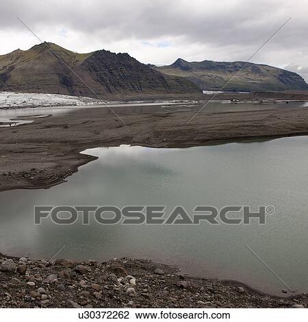 Glacial lake and plain, mountains View Large Photo Image Stock Image - Glacial lake and plain, mountains. Fotosearch