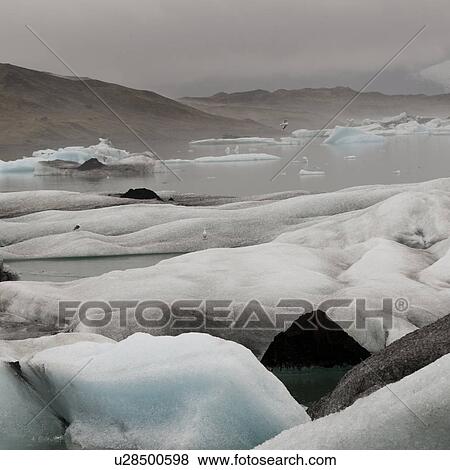 Glacier and iceberg View Large Photo Image Stock Photo - Glacier and iceberg. Fotosearch