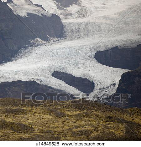 Stock Photo - Glacier in mountain valley. Fotosearch