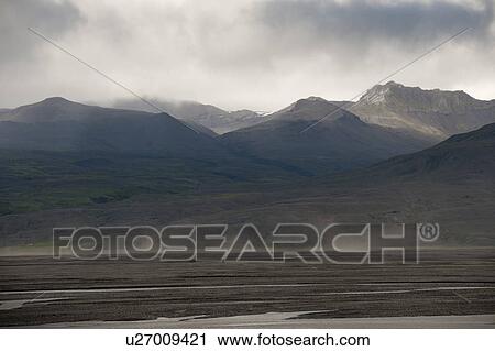 Grey cloud landscape of mountain range and meadow View Large Photo Image Stock Image - Grey cloud landscape of mountain range and meadow. Fotosearch
