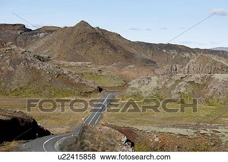 Stock Photo - Highway through mountain valley. Fotosearch