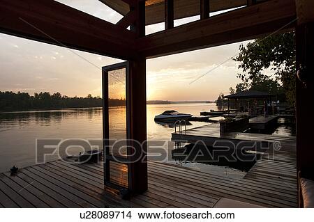 Picture - Horizon at sunset in Lake of the Woods, Ontario. Fotosearch