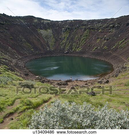 Stock Photograph - Lake in round volcano crater. Fotosearch