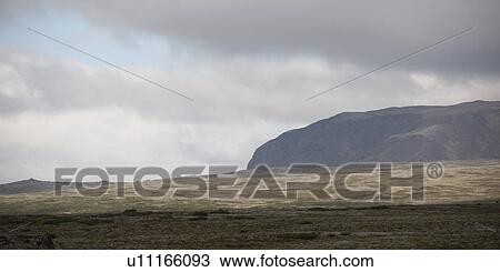 Landscape, distant mountain range, grasslands in forefront View Large Photo Image Stock Image - Landscape, distant mountain range, grasslands in forefront. Fotosearch