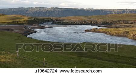 Picture - Landscape, farmland, pond, eroded cliffs. Fotosearch
