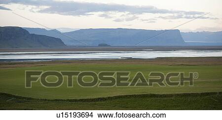 Landscape, farmland, river, mountains, sky and clouds View Large Photo Image Picture - Landscape, farmland, river, mountains, sky and clouds. Fotosearch