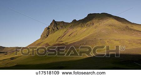 Landscape, grass covered eroding mountain peak View Large Photo Image Stock Photo - Landscape, grass covered eroding mountain peak. Fotosearch