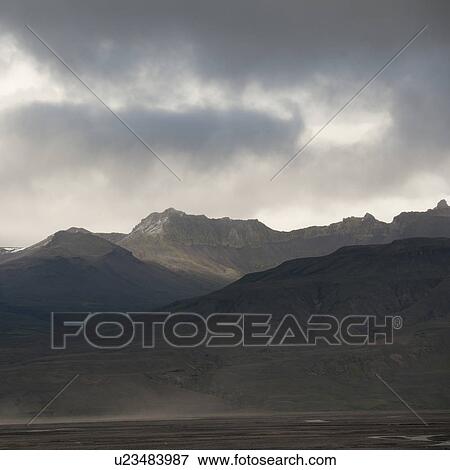 Landscape, mountain range under stormy skies View Large Photo Image Stock Photo - Landscape, mountain range under stormy skies. Fotosearch