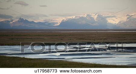 Landscape, wetlands before showcapped mountains View Large Photo Image Stock Image - Landscape, wetlands before showcapped mountains. Fotosearch